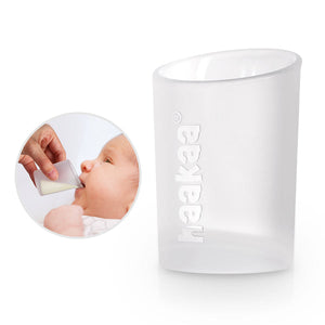 Clear container, a feeding cup with Haakaa imprinted and a small inset showing a baby using the product.